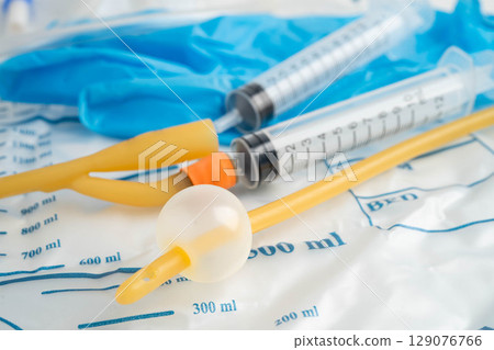 Foley catheter and urine drainage bag collect urine for disability or patient in hospital. 129076766