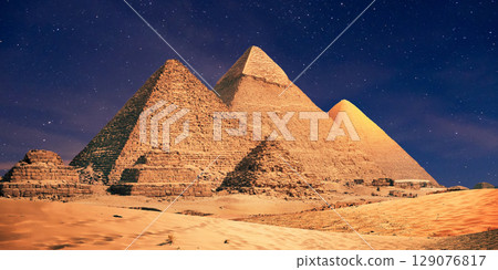 night scene of the castle pyramid in the desert 129076817
