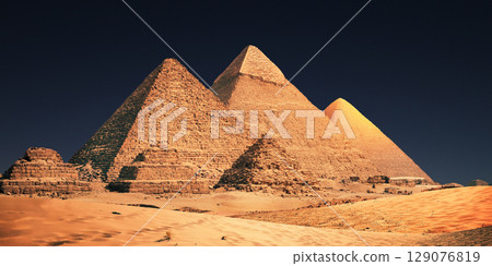 night scene of the castle pyramid in the desert 129076819