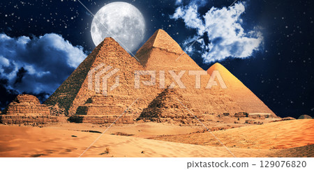 night scene of the castle pyramid in the desert 129076820