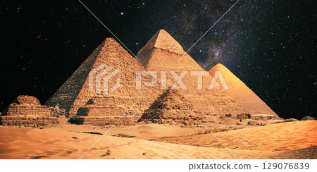 night scene of the castle pyramid in the desert 129076839