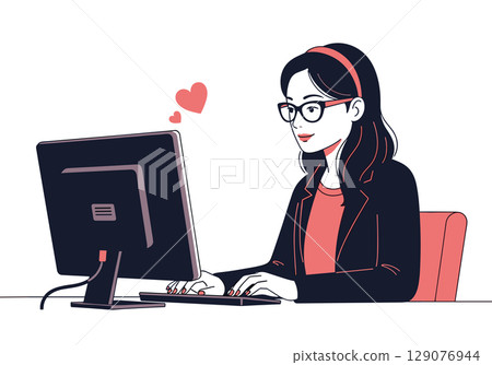 一位戴眼鏡的年輕女子在電腦上工作 129076944