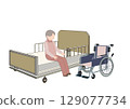 Picture of an elderly man and wheelchair trying out a care bed 129077734