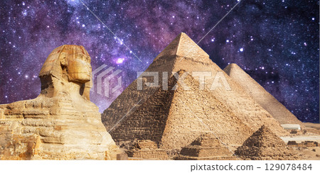 night scene of the castle pyramid in the desert 129078484