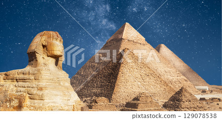 night scene of the castle pyramid in the desert 129078538