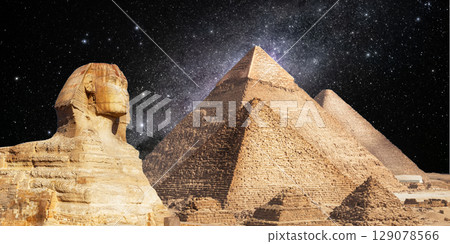 night scene of the castle pyramid in the desert 129078566