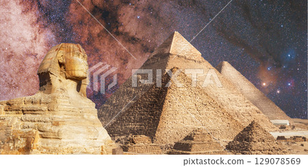 night scene of the castle pyramid in the desert 129078569
