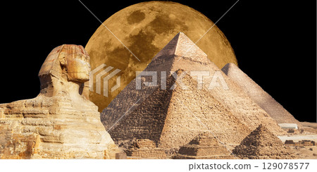 night scene of the castle pyramid in the desert 129078577
