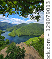 Piatra lui Lucaci hiking trail view over Tarnita Lake. Cluj, Romania 129079013