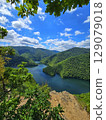 Piatra lui Lucaci hiking trail view over Tarnita Lake. Cluj, Romania 129079018
