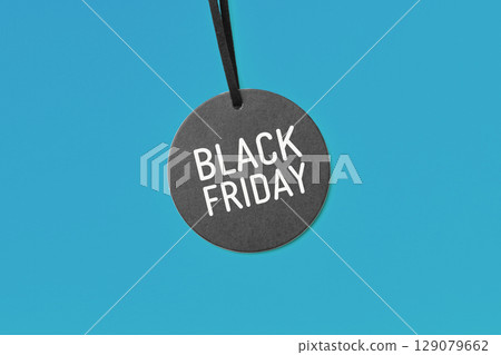 Black friday word on sale tag on blue background 129079662