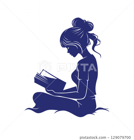 Girl Relaxing and Reading a Book Outdoors Girl Relaxing and Reading a Book Outdoors 129079700
