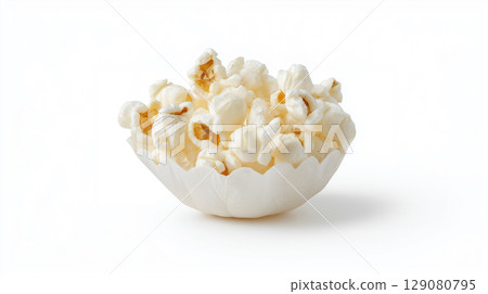 A small paper cup full of fresh popcorn snack isolated on a white background 129080795