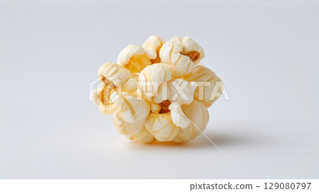 Single piece of fresh crunchy popcorn isolated on a white background 129080797