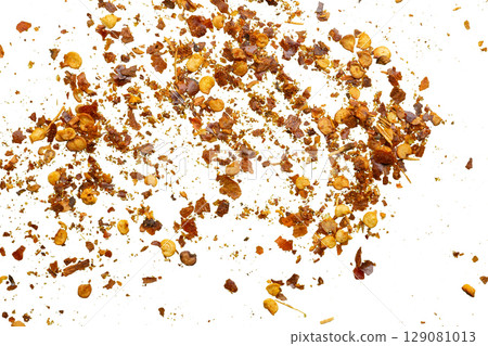 dried red chili pepper flakes and seeds isolated on white background 129081013