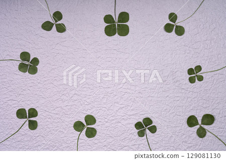 Gray Japanese paper and four-leaf clover background material Gray Japanese paper and four-leaf clover background material 129081130