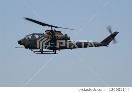 Side view of an attack helicopter Side view of an attack helicopter 129081144