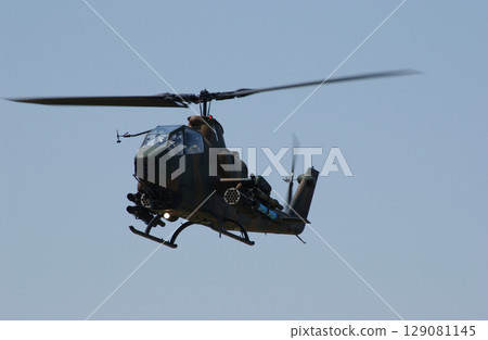 Attack helicopter seen from the front Attack helicopter seen from the front 129081145