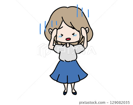A depressed woman holding her head A depressed woman holding her head 129082035