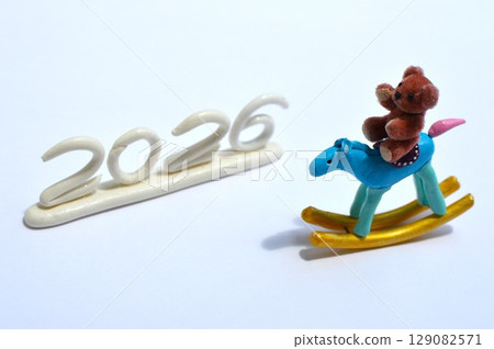 Paper clay rocking horse and teddy bear New Year's materials 129082571