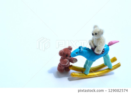 Paper clay rocking horse and teddy bear New Year's materials Paper clay rocking horse and teddy bear New Year's materials 129082574
