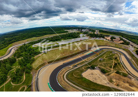 Beautiful drone shot of the race track from above. Automotodrom Brno Masaryk Circuit. Motorcycle racing Czech Republic Europe. 129082644