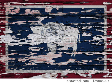 Flag of Wyoming painted on a board Flag of Wyoming painted on a board 129083003