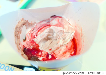 Strawberry and chocolate mixed ice cream - a fast food cup dessert 129083840