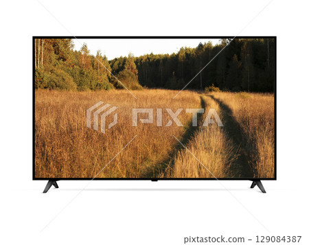 Smart tv with country road in a field on the screen 129084387