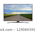 Smart tv with country road on screen 129084395