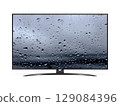 Smart tv with water drops on screen 129084396
