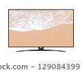 Smart tv with ocean beach on screen 129084399