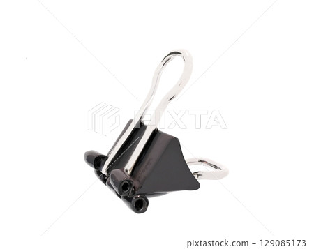 Double clips used for organizing documents at school, work, or in the office 129085173