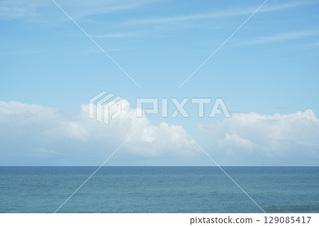 Sea and summer clouds Sea and summer clouds 129085417