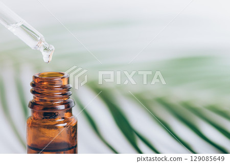 Bottle of essential oil Bottle of essential oil 129085649