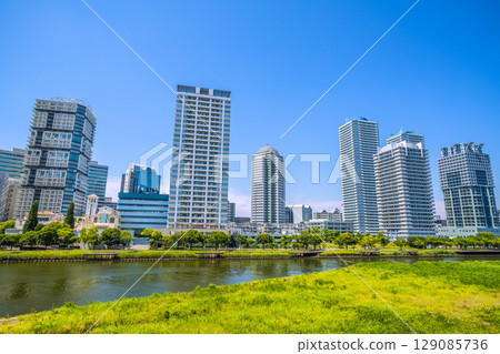 Yokohama cityscape in Japan. View of tower apartment buildings on the riverside of Yokohama. 129085736