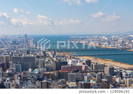 Osaka cityscape: Umeda Sky Building, view from the Floating Garden Observatory Osaka cityscape: Umeda Sky Building, view from the Floating Garden Observatory 129086291