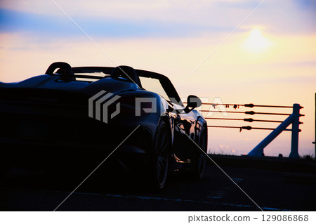 A shiny black convertible 129086868