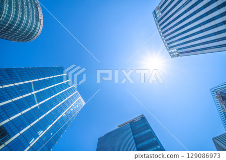 Yokohama cityscape in July. Overlooking the business district in front of Shin-Takashima Station. 129086973