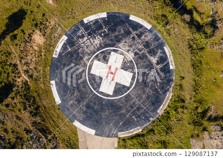 Helicopters landing area. Aerial view of helipad sign. Heliport signal. Helicopters landing area. Aerial view of helipad sign. Heliport signal. 129087137