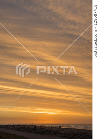 Hokitika Beach and sunset sky in the West Coast region of New Zealand 129087419