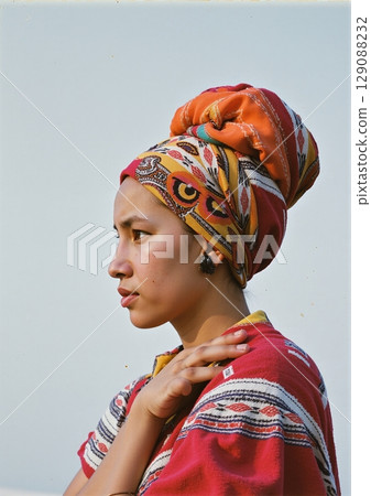 Confident women proudly wear headscarves, embracing cultural identity with warm smiles and graceful dignity 129088232