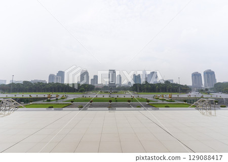 Jakarta, Indonesia - Mar 31,2024 : The National Monument is a 132m tower in the centre of Merdeka Square in Jakarta, Indonesia on Mar 31,2024. 129088417