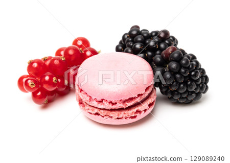 Small tasty sweet original classic macaroon cake with fresh blackberry and redcurrant on top isolated on white studio background Small tasty sweet original classic macaroon cake with fresh blackberry and redcurrant on top isolated on white studio background 129089240