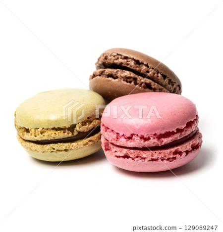 Small colorful tasty sweet original classic macaroons cakes isolated on white studio background Small colorful tasty sweet original classic macaroons cakes isolated on white studio background 129089247