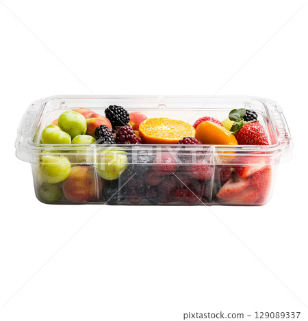 Fresh fruit assortment in clear plastic container, featuring grapes, strawberries, blackberries, raspberries, oranges, and apples, perfect for healthy snacking 129089337
