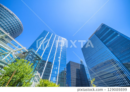Yokohama cityscape in July. Overlooking the business district in front of Shin-Takashima Station. 129089899