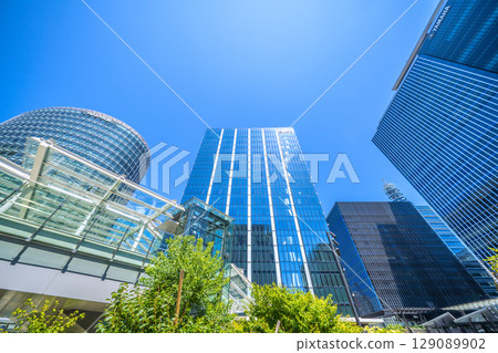 Yokohama cityscape in July. Overlooking the business district in front of Shin-Takashima Station. 129089902