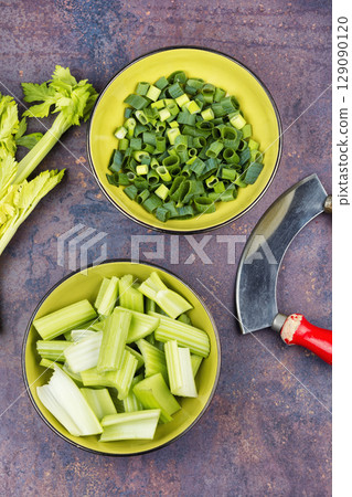 Celery stalks, green stalks, freshly harvested. Celery stalks, green stalks, freshly harvested. 129090120