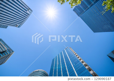 Yokohama cityscape in July. Overlooking the business district in front of Shin-Takashima Station. 129090187